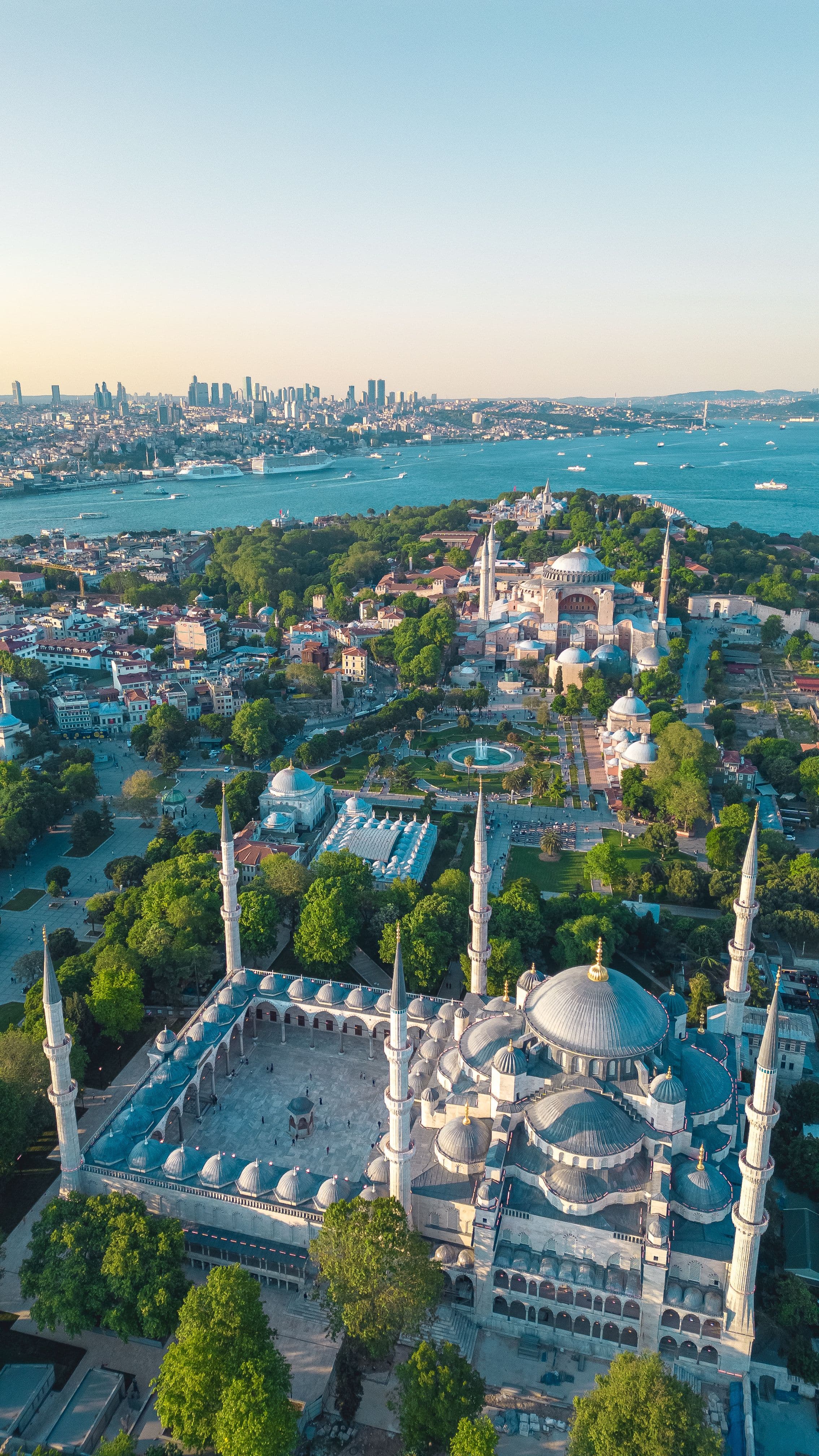 A stunning aerial view of the Blue Mosque in Istanbul with a backdrop of the city and Bosphorus.  More info  Share